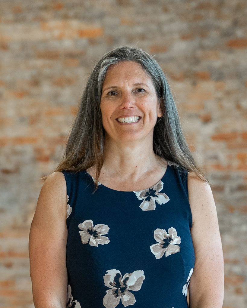 A smiling photo of Laurie
